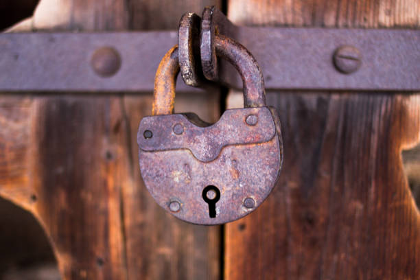 istock lock on old wooden door 1093493578
