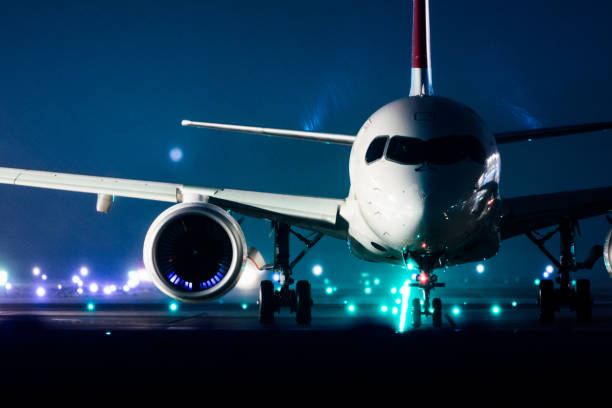 istock Commercial jet front view in the snow 1093495950