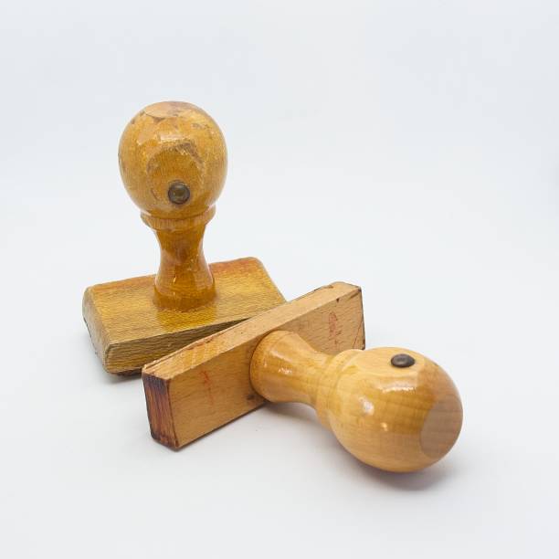 istock Shot to some wooden stamping tools over white background 1093496830