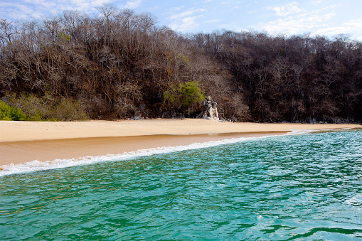 Huatulco, Mexico-March 06, 2016: Beach. Huatulco Bay is a picturesque Paradise with amazing mountains, slopes, valleys and abundant vegetation, magnificent beaches.