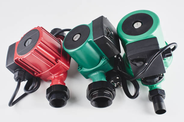istock Red and green circulation pumps for heating on a white background. 1093498548