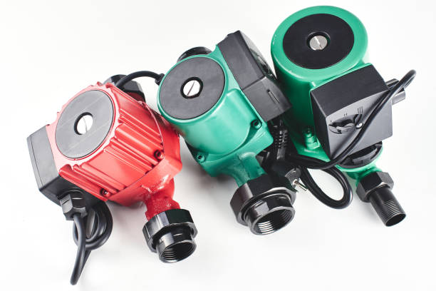 istock Red and green circulation pumps for heating on a white background. 1093501500