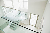 Glass railing on staircase in modern house