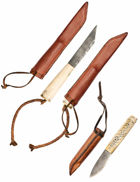 istock Ancient Viking weapons isolated on white background. Knives and leather covers 1093506046