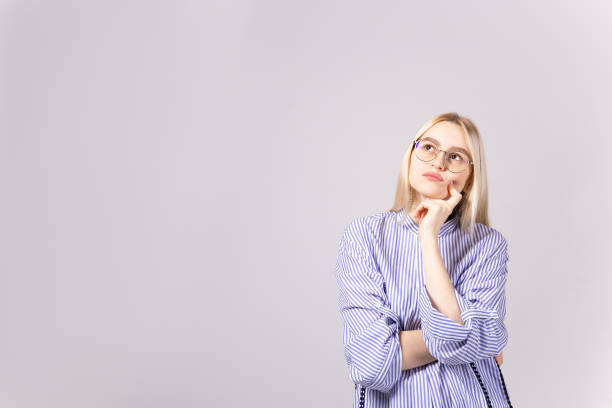 istock Attractive young woman posing over grey background. 1093510670