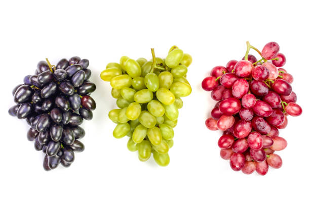 istock green pink and blue grapes isolated on the white background 1093512674