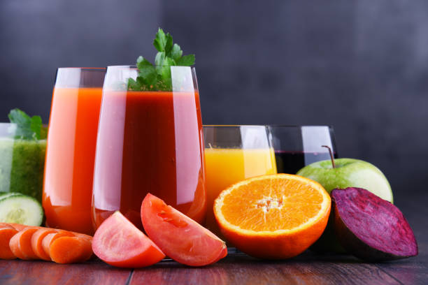 istock Glasses with fresh organic vegetable and fruit juices 1093513118