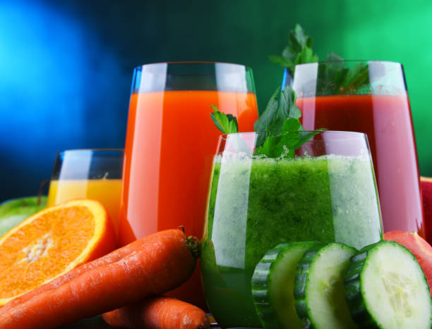 istock Glasses with fresh organic vegetable and fruit juices 1093513124