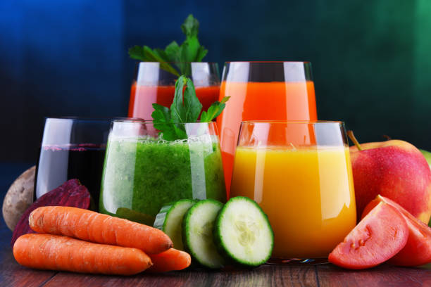 istock Glasses with fresh organic vegetable and fruit juices 1093514270