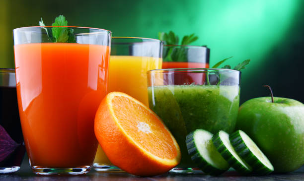 istock Glasses with fresh organic vegetable and fruit juices 1093514356