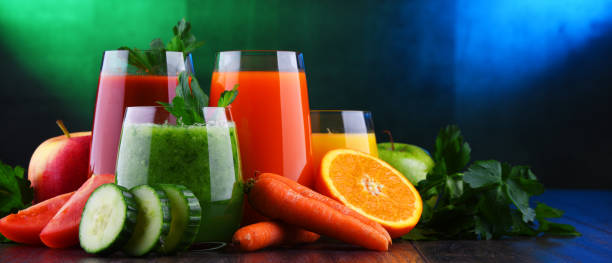 istock Glasses with fresh organic vegetable and fruit juices 1093514416