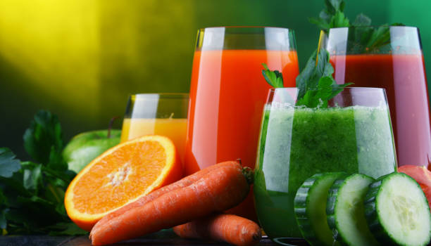 istock Glasses with fresh organic vegetable and fruit juices 1093514568
