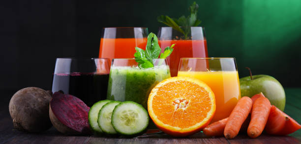 istock Glasses with fresh organic vegetable and fruit juices 1093514734