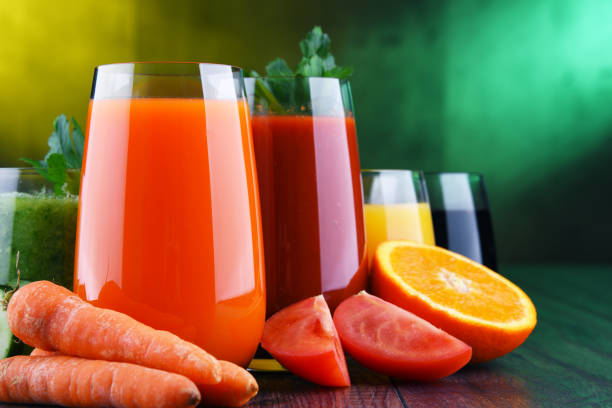istock Glasses with fresh organic vegetable and fruit juices 1093514828