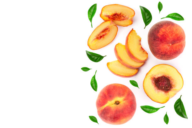 istock ripe peaches with leaves isolated on white background with copy space for your text. Top view. Flat lay pattern 1093515050