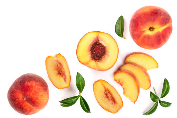 istock ripe peaches with leaves isolated on white background with copy space for your text. Top view. Flat lay pattern 1093515114