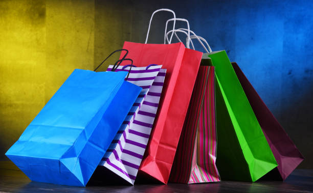 istock Composition with colorful paper shopping bags 1093515464
