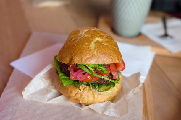 istock Vegan burger on the table in the cafe 1093515624