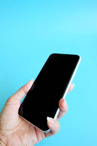 istock Woman hand holding a mobile phone 1093522670