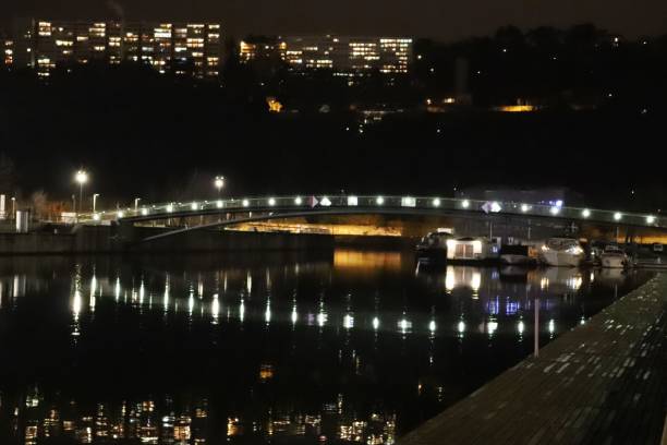 istock LYON - CONFLUENCE AT NIGHT - DARSE AND AGAINST COMMERCIAL 1093525990