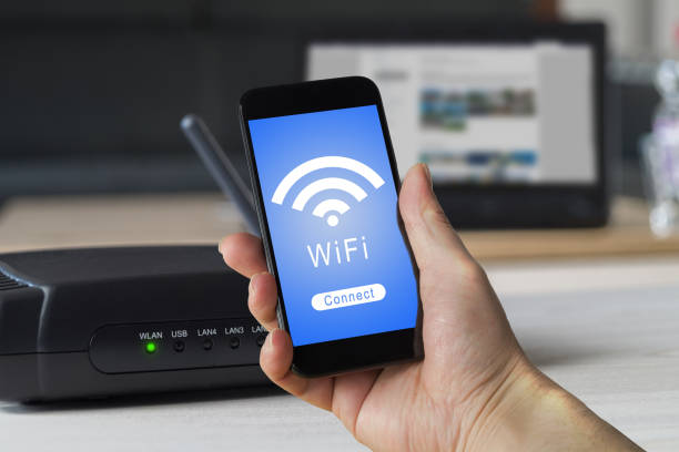 wifi 無線 lan 携帯電話ホーム - ルーター ストックフォトと画像