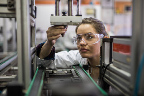 istock Female engineer examining machine part on a production line. 1093532558