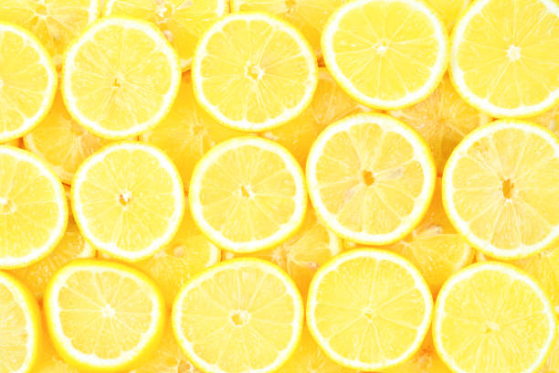 istock A slices of fresh juicy yellow lemons.  Texture background, pattern. 1093537468