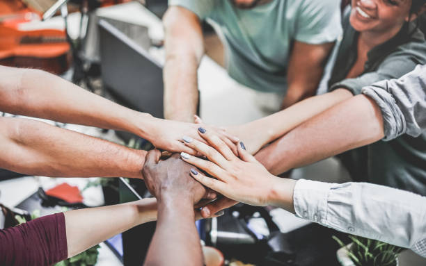 istock Young work team celebrating for new startup in creative office - Happy students giving strength motivation - Focus on top hand - Co-working, business, technology, influencer and marketing concept 1093550968