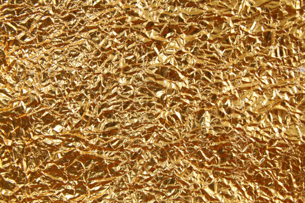 istock Shiny metal yellow golden texture background. Metallic gold pattern 1093551612