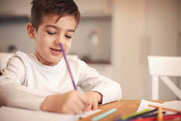 istock Family at home doing homework together 1093558390