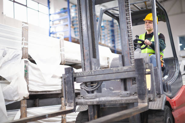 istock Senior worker in the factory driving forklift 1093559564