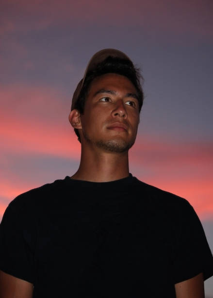 istock Young man with determined look and tanned skin 1093569470