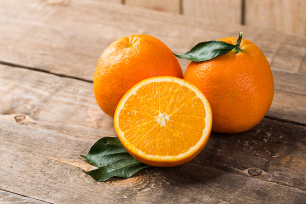 istock Orange fruit on wooden table. Orange fruit, healthy food. 1093577814