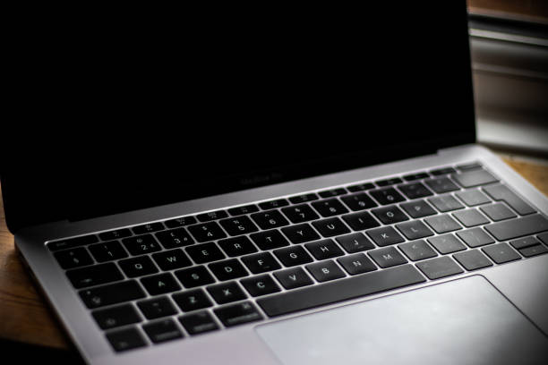 istock Laptop Keyboard Black close up, space grey pc, vignette 1093578114