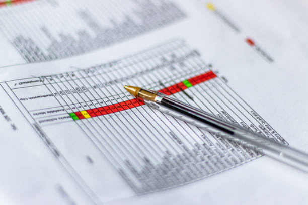 istock Open Black Pen on data/analysis/finance/document/sheet of paper. Close-up 1093578464