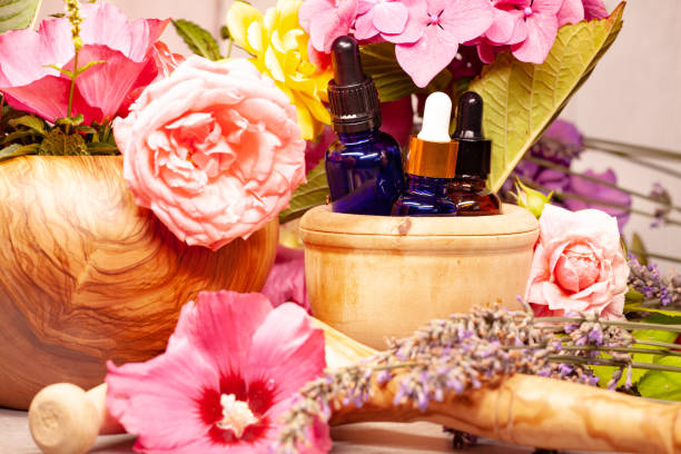 istock flowers and bottles of essential oils for aromatherapy 1093578490