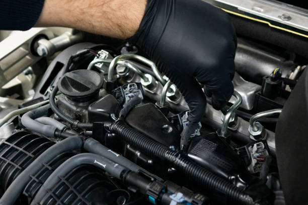 istock Auto mechanic working in garage. Repair service. 1093579502