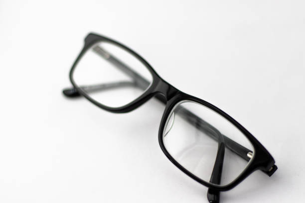 istock Pair of black glasses on white background 1093579682