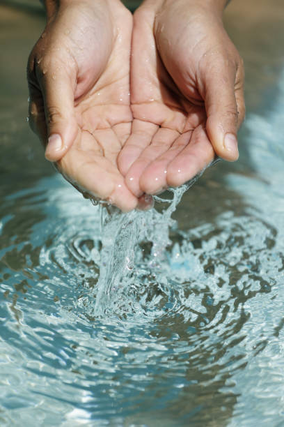 istock Clear water in woman hands 1093586248