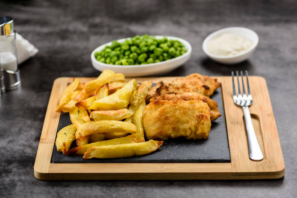 istock Fish and chips - food from British pubs 1093588356
