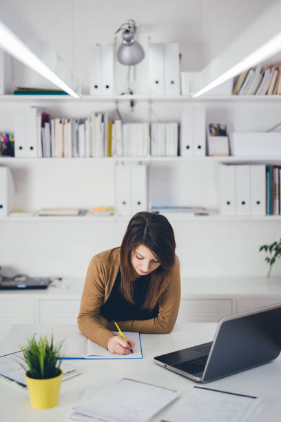 istock Businesswoman working in her office 1093590088
