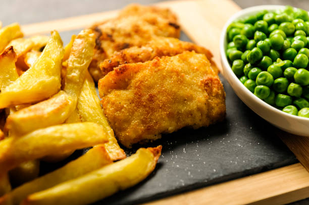 istock Fish and chips - food from British pubs 1093590600