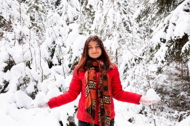 istock Woman portrait in winter forest 1093590850