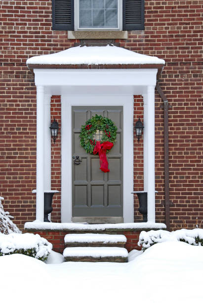 istock snow covered front steps of a house 1093590970