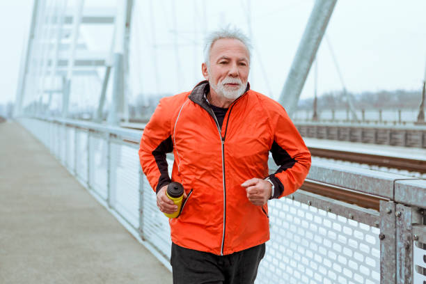 istock Active senior man running in the morning 1093591332