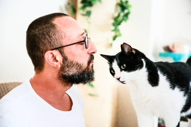 istock Man Kissing His Cat 1093596818