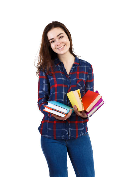 istock Woman holding book isolated on white background 1093597098