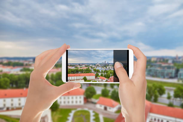 istock A man shooting panorama of Vilnius 1093604908