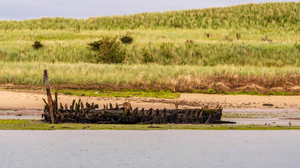 istock Old Shipwreck, seen in Amble, England, UK 1093605970