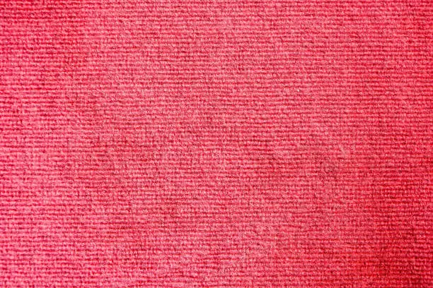 Photo of Elegance red color carpet texture background
